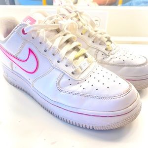 Nike air forces pink swoosh